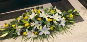 White Lily & Yellow Rose Casket Spray
